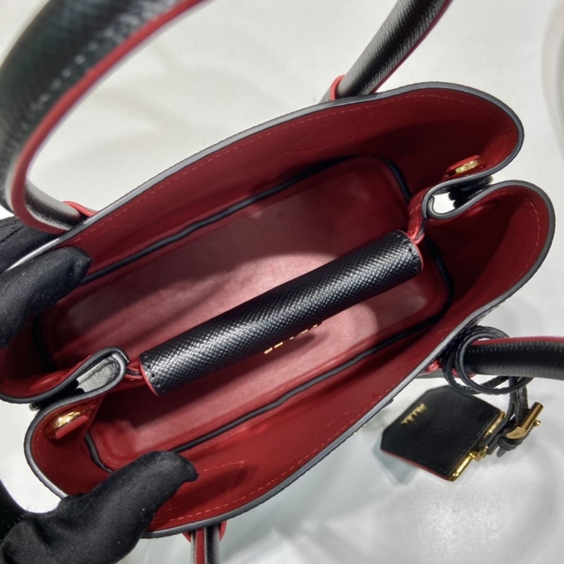 Pra*a top handle bags